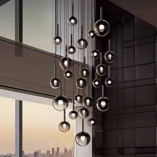 Elegant Nordic Stair Chandelier — Living & Dining Room Pendant Ceiling Light featuring multiple glass orbs suspended at varying heights, perfect for modern pendant lighting and luxury home décor.