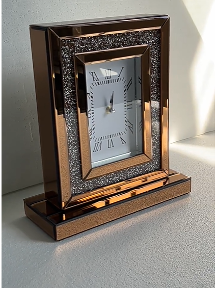 Gold pendulum table clock with glass dome white face and polished decorative base