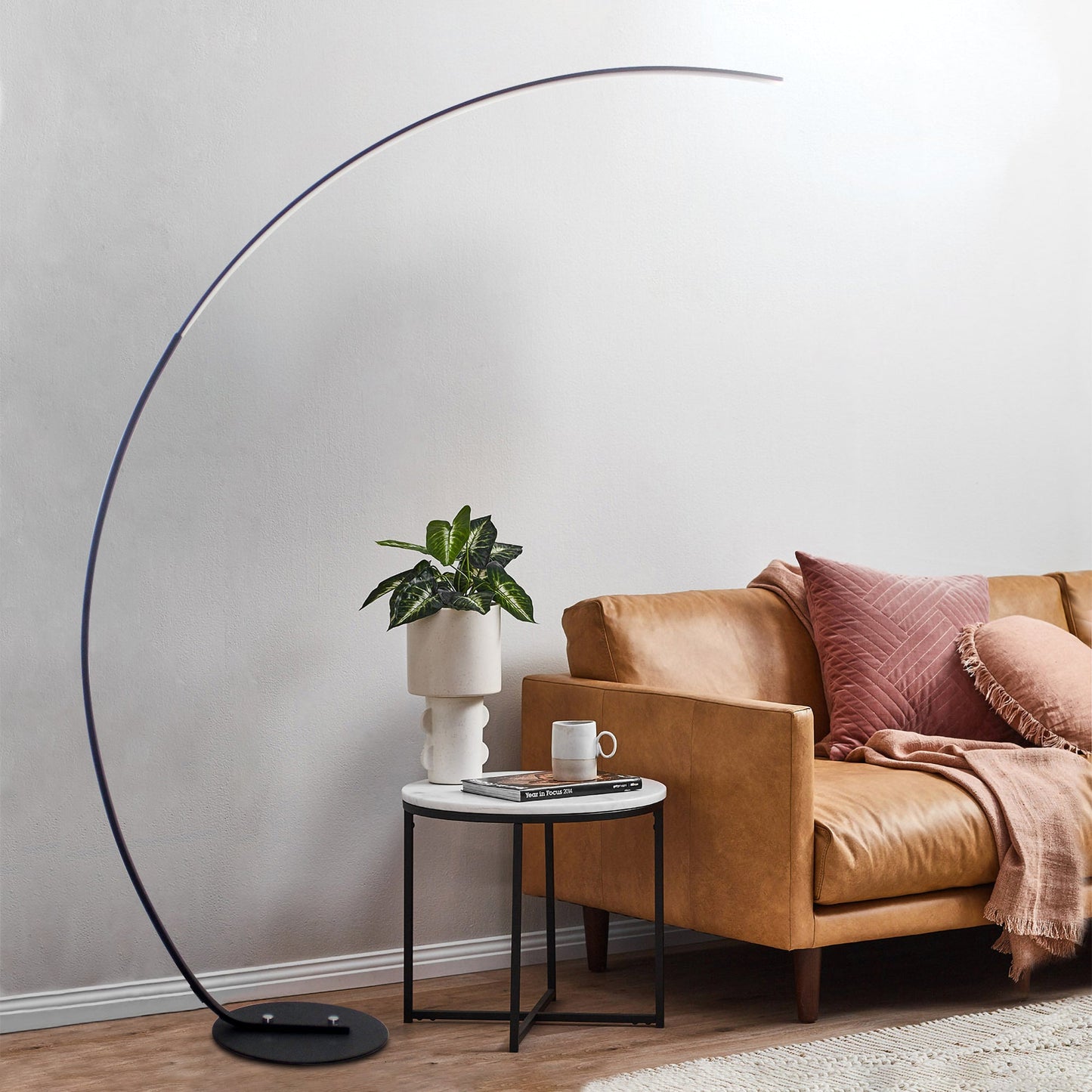 Curve floor lamp lifestyle shot - RGBW color LED living room decor