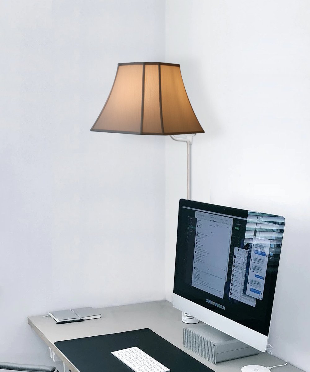Eggshell wall sconce close-up - 16-inch floating shade plug-in light