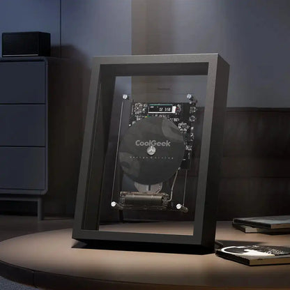 Transparent wall-mounted CD player with visible disc speakers and remote control