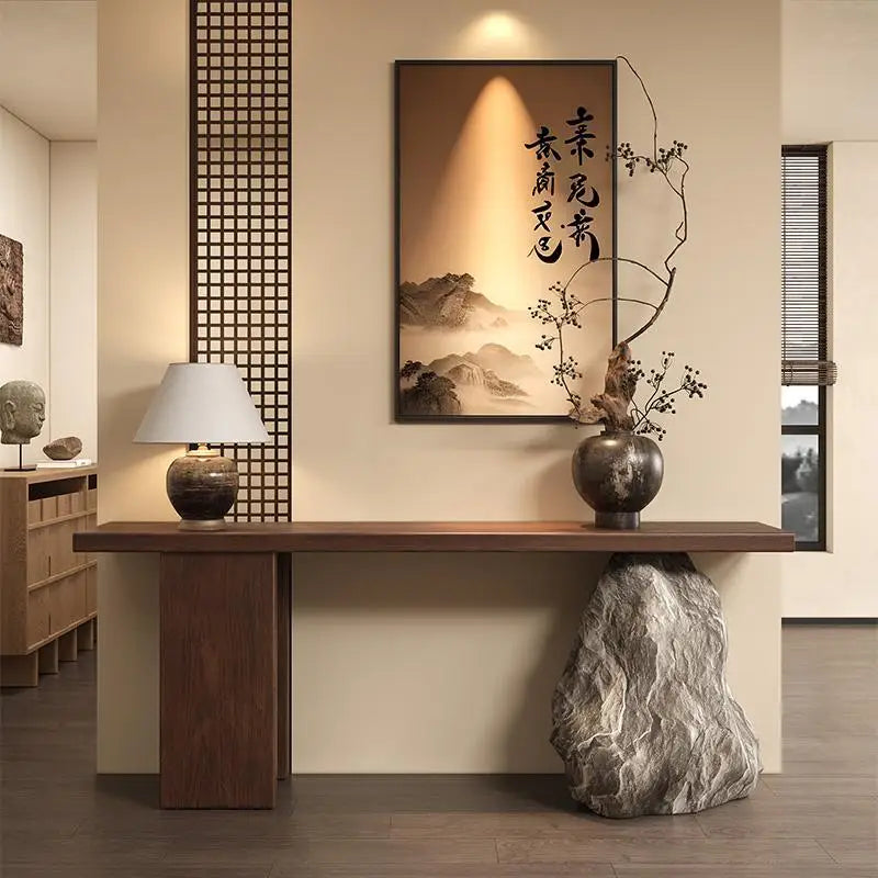 Luxury minimalist console table with slim top and sculptural modern base