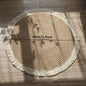 The Grounding Layer — Handwoven Natural Jute Round Rug with Tassels