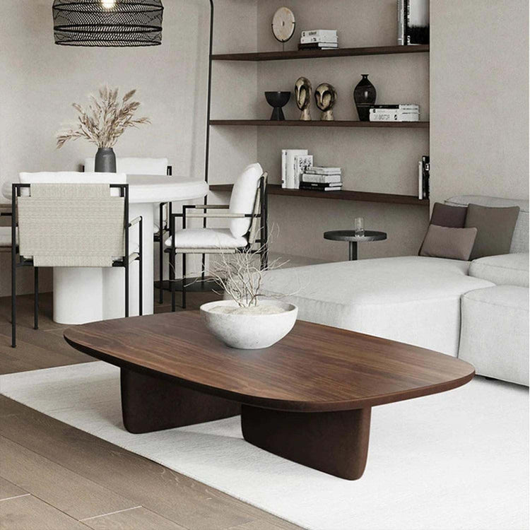 Nordic minimalist coffee table with modern wood and glam finish in stylish living room setting