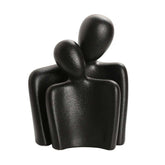 Abstract ceramic love sculpture of two embracing figures for home décor and gifting