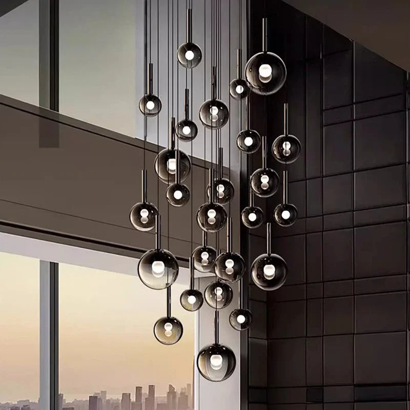 Elegant Nordic Stair Chandelier — Living & Dining Room Pendant Ceiling Light featuring multiple glass orbs suspended at varying heights, perfect for modern pendant lighting and luxury home décor.