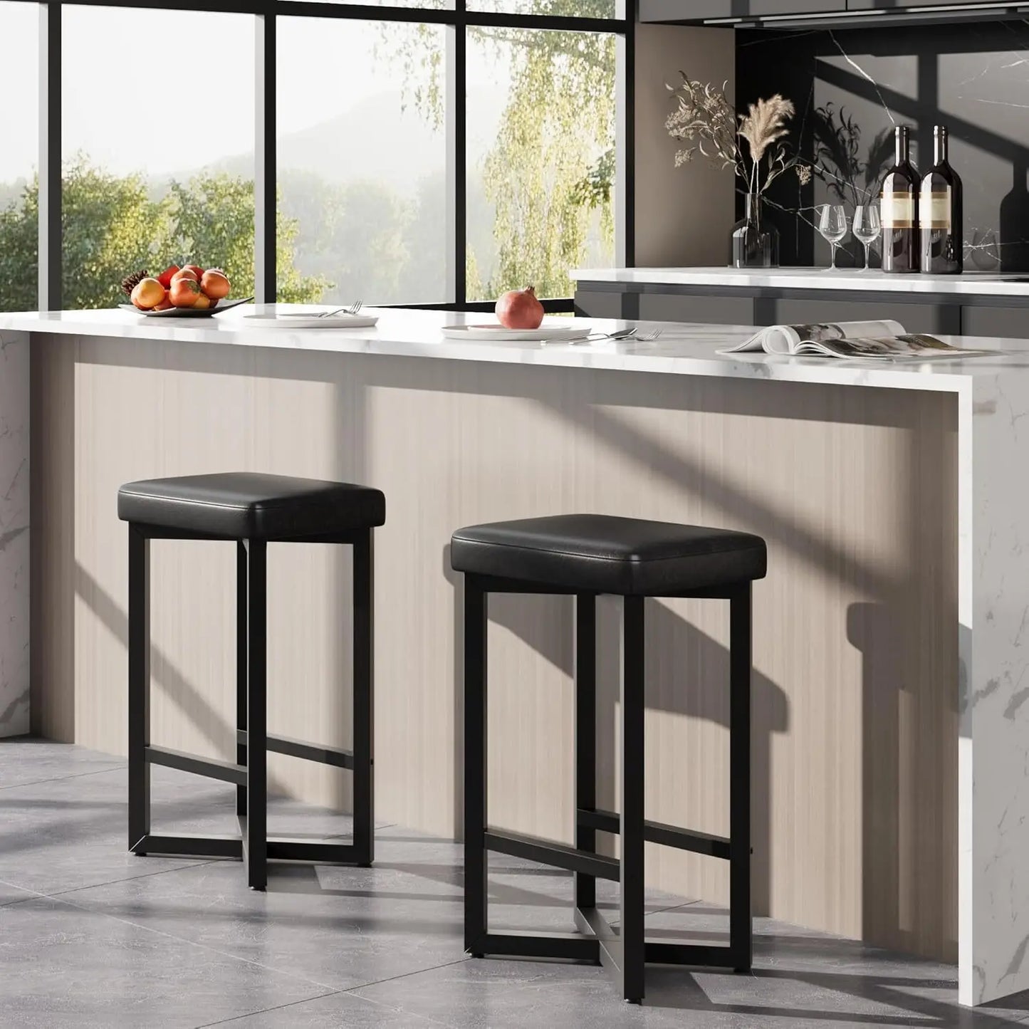 Modern kitchen interior featuring a 24" Bar Stools Set of 2 — Backless Counter Height with PU Leather Seat in black, paired with a light wood breakfast bar and natural sunlight.