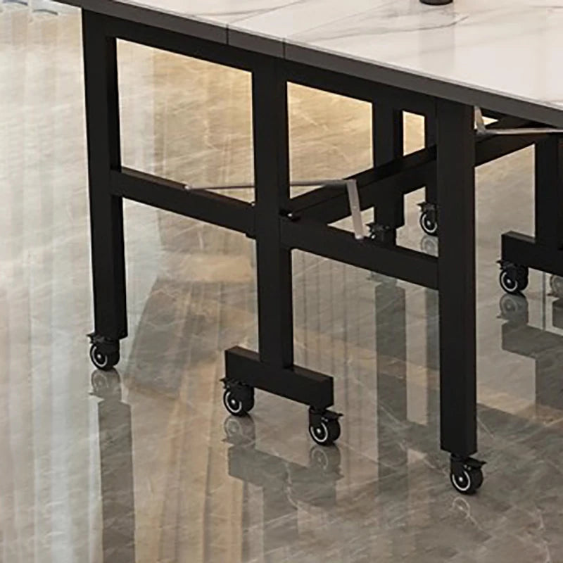 Extendable Dark Luxury Dining Table — Space-Saving with Casters