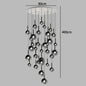 Nordic Stair Chandelier — Living & Dining Room Pendant Ceiling Light with multiple black spherical pendants suspended at varying heights from a round white ceiling mount, showcasing a modern Nordic design.