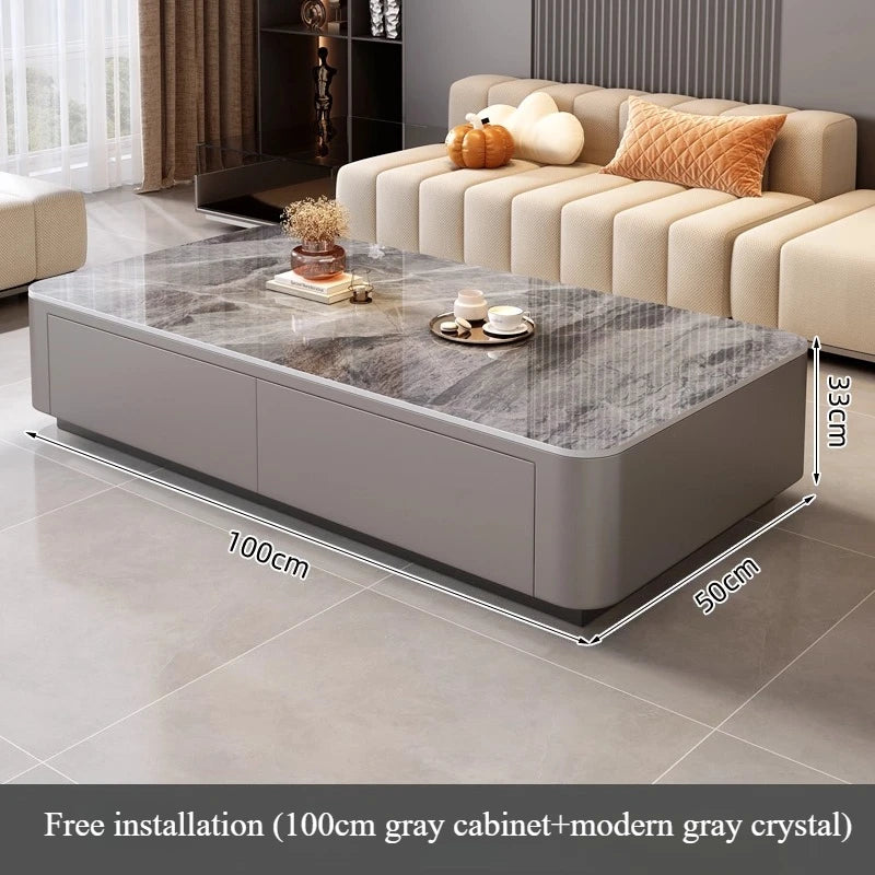 Nordic Clear Designer Coffee Table — Minimalist Living Room Décor featuring a sleek gray base with a clear crystal top, styled with decorative items in a modern living space.