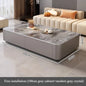 Nordic Clear Designer Coffee Table — Minimalist Living Room Décor featuring a sleek gray base with a clear crystal top, styled with decorative items in a modern living space.