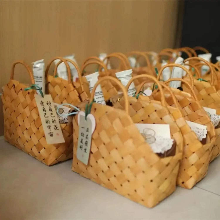 Woven flower gift basket with natural fibers filled with flowers for weddings and festivals