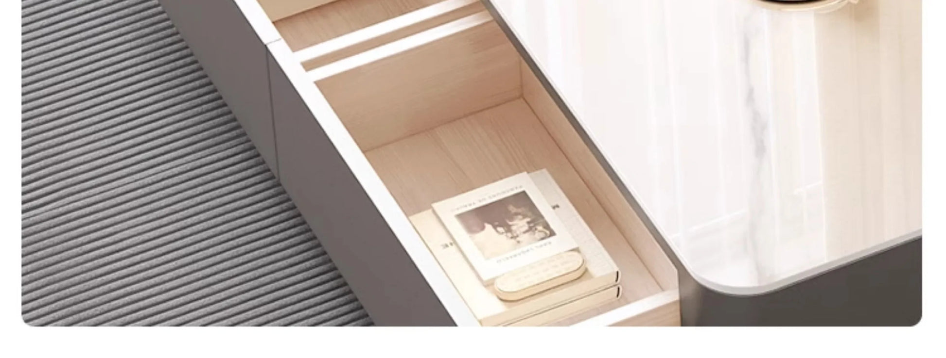 Partial view of a Nordic Clear Designer Coffee Table — Minimalist Living Room Décor showing a light wood drawer with a photo frame and a rounded white surface, highlighting minimalist Nordic design.