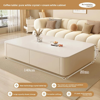 Nordic Clear Designer Coffee Table — Minimalist Living Room Décor featuring a pure white crystal top with cream white cabinet, rounded edges, and spacious drawer storage in a modern minimalist style.