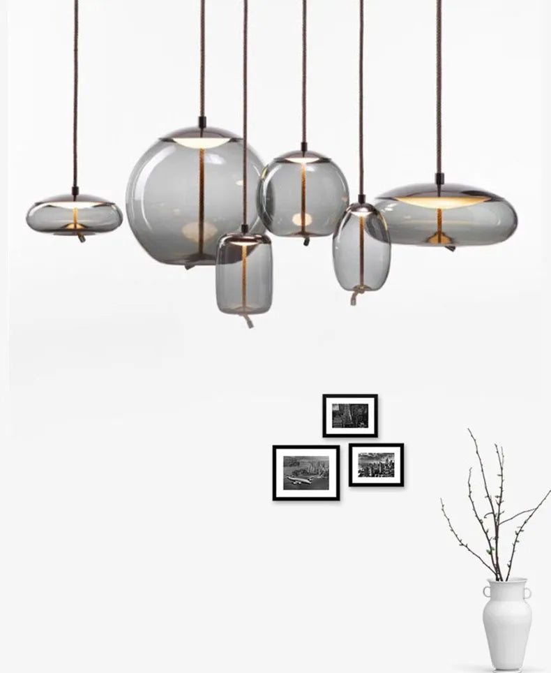 Modern LED Pendant Light — Chandelier for Living & Dining Room featuring a set of five elegant smoked glass pendant lights in varying organic shapes, perfect for minimalist and Nordic-inspired interiors.