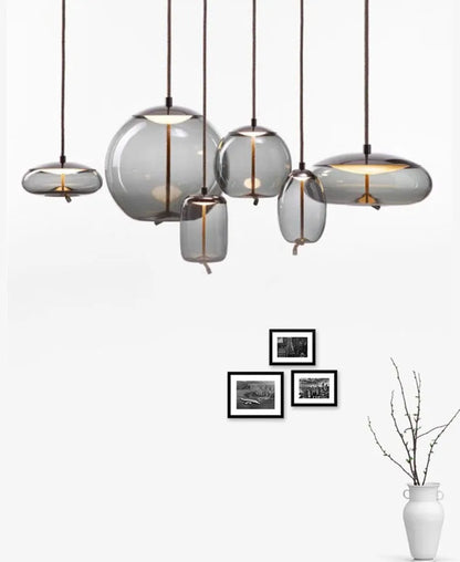 Modern LED Pendant Light — Chandelier for Living & Dining Room featuring a set of five elegant smoked glass pendant lights in varying organic shapes, perfect for minimalist and Nordic-inspired interiors.