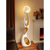 Movement Frozen in Time — Resin Floor Sculpture with Ambient Light