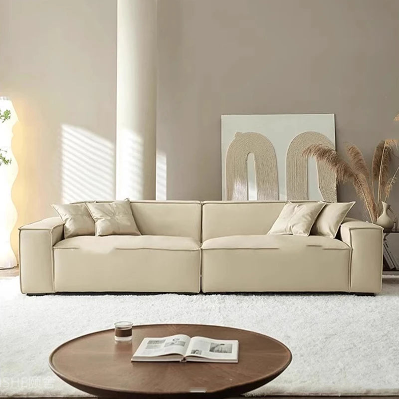 Space-saving luxury sofa with curved arms plush cushions and modern compact design