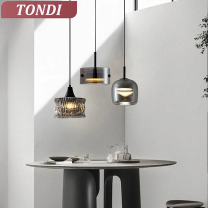 Nordic glass LED pendant lamp with clear globe shade and warm glowing center