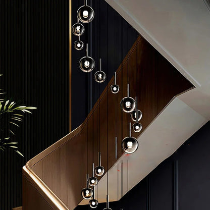 Nordic Stair Chandelier — Living & Dining Room Pendant Ceiling Light hanging in a modern staircase space with spherical glass pendants and sleek minimalist design, showcasing Nordic design elegance.