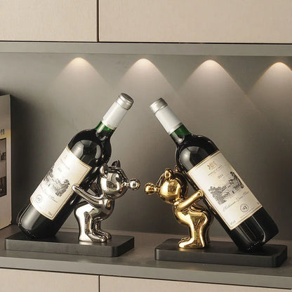 Ceramic wine rack accent with sculptural bottle holder and glossy decorative finish