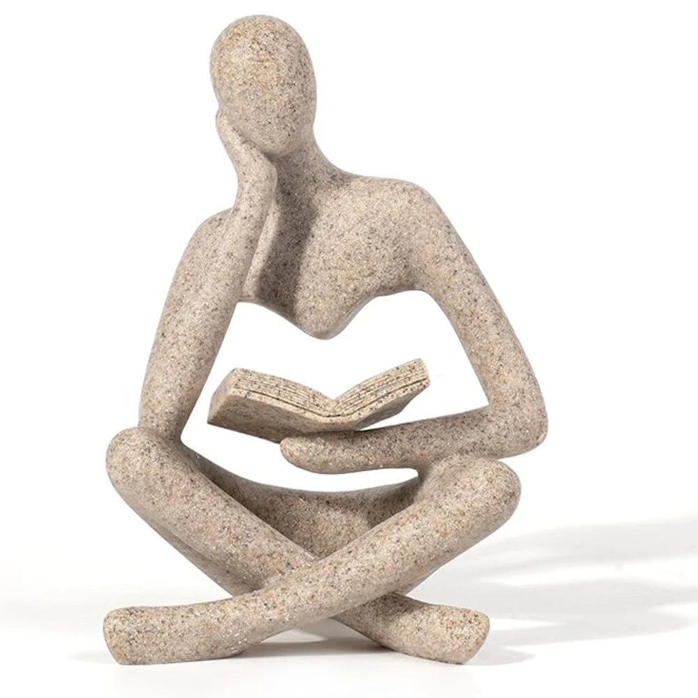 Abstract thinker sculpture with seated figure pose and smooth black display base