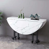 Round foldable dining table with rolling casters and foldable top, seats six, minimalist design