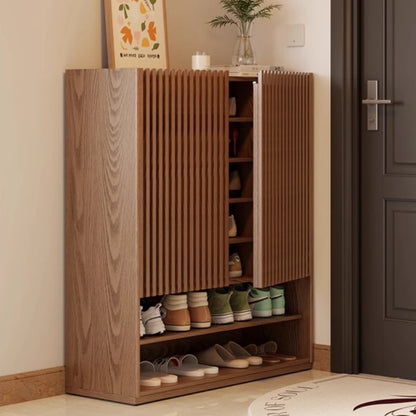 Vintage wood shoe rack with cabinet storage and carved luxury entryway details