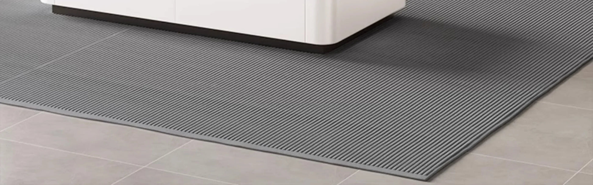 Nordic Clear Designer Coffee Table — Minimalist Living Room Décor showcasing a sleek, modern gray textured area rug beneath on tiled flooring.