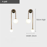 The Warm Detail — Gold Glass Ball Wall Sconce