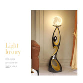Movement Frozen in Time — Resin Floor Sculpture with Ambient Light