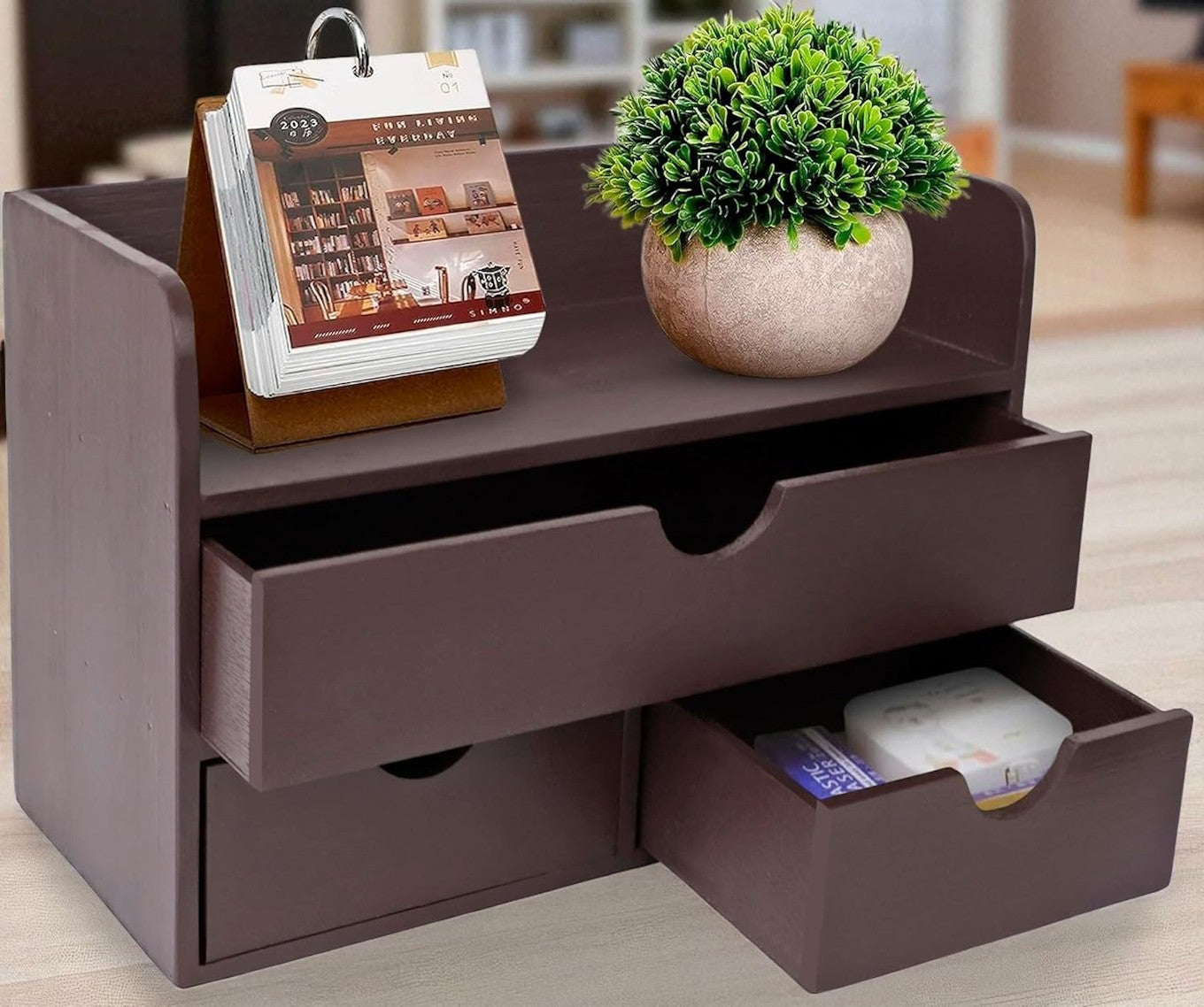 Brown wooden desk organizer with small drawers and compartments for office supplies