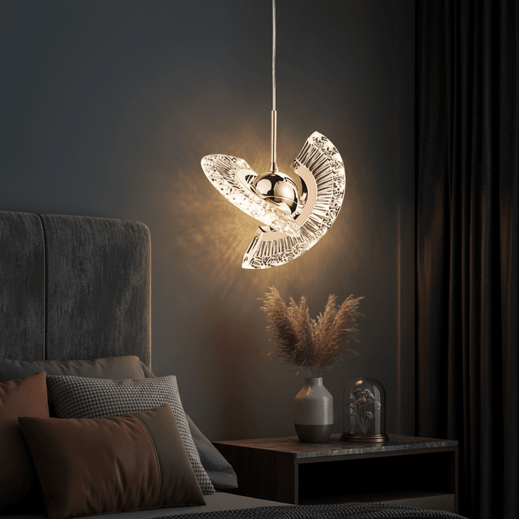 Modern rose gold LED pendant light with sleek metal finish in stylish bedroom setting